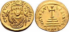 Tiberius II Constantine AV Solidus. Constantinople, circa AD 579. CONSTANT AЧC ЧIЧ FЄLIX, bust facing, wearing crown with pendilia, in consular robes,...