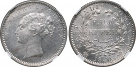India, British Colonial. Victoria AR 1/2 Rupee. Calcutta mint, 1840 C. VICTORIA QUEEN, diademed head to left / Denomination in English and Urdu within...