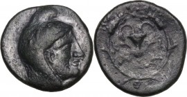 Greek Asia. Bithynia, Kios. AE 14 mm. Circa 3rd century BC. Obv. Head of Mithras right, wearing a laureate tiara. Rev. Kantharos with two grape vines ...