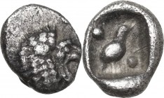 Greek Asia. Caria, Mylasa. AR Tetartemorion, circa 420-390 BC. Obv. Head of roaring lion right. Rev. Bird standing right; pellets flanking. SNG Kayhan...