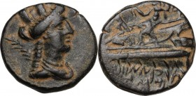 Greek Asia. Phoenicia, Arados. AE 17 mm, 2nd-1st century BC. Obv. Bust of Tyche right, draped, turreted; behind, palm branch. Rev. Poseidon seated lef...