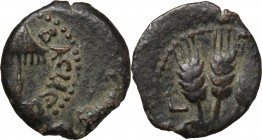 Greek Asia. Judaea. Agrippa I (37-44). AE Prutah, year 6 (41/42). Jerusalem mint. Obv. Umbrella-like canopy with fringes. Rev. 'Year 6'. Three ears of...