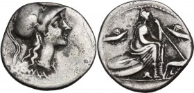 Anonymous. AR Denarius, 115-114 BC. Obv. Head of Roma right, helmeted. Rev. Roma seated right on pile of shields, holding spear; before, she-wolf suck...