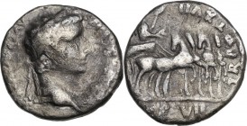 Tiberius (14-37 AD). AR Denarius. Lugdunum mint, 15-16 AD. Obv. Laureate head right. Rev. Tiberius, laureate and cloaked, standing in slow quadriga ri...