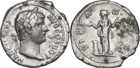 Hadrian (117-138). AR Denarius, struck 117 AD. Obv. Laureate bust right, drapery on left shoulder. Rev. Pietas veiled standing left, raising right han...
