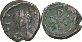 Vandals. Pseudo-Imperial coinage. AE 10 mm. Circa 5th- 6th century. Obv. Diademed and draped bust right. Rev. Christogram within laurel wreath. BMC Va...