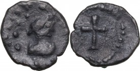 AE (or AR?) 10mm. Contemporary imitation of anonymous issue of Justinian I, 6th cent. AD. Obv. Helmeted and draped bust right. Rev. Cross. AE?. 1.04 g...