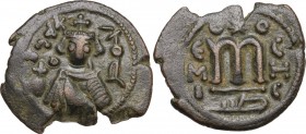 The Umayyad Caliphate. Arab-Byzantine coinage (Pseudo-Byzantine type). temp. Abd al-Malik ibn Marwan (AH 65-86 / AD 685-705). AE Fals, Hims (Emesa), c...