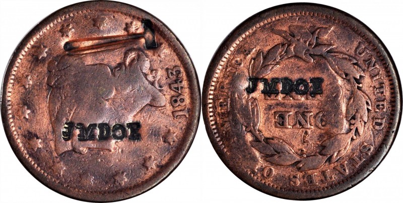 Counterstamps

(HAMMER) / JM DOE on an 1843 Braided Hair large cent. Brunk-Unl...