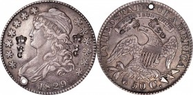 Counterstamps

(crown) / VR / C counterstamped twice on both sides of an 1829 O-110 Capped Bust half dollar. Brunk-Unlisted, Rulau-Unlisted. Host co...
