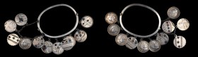 Engraved Coins, Love Tokens, and Coin Jewelry

Love Token Bracelet Made of 11 1892-dated Barber Dimes. 

All but two of the coins are engraved wit...