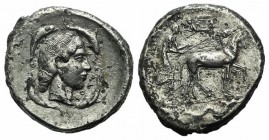 Sicily, Syracuse, c. 466-405 BC. AR Tetradrachm (29mm, 15.60g, 7h), c. 450-440 BC. Charioteer driving quadriga r.; above, Nike flying r., crowning hor...