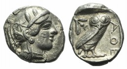 Attica, Athens, c. 454-404 BC. AR Tetradrachm (26mm, 17.16g, 9h). Head of Athena r., wearing crested Attic helmet. R/ Owl standing r.; olive sprig and...