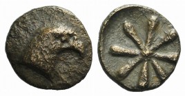 Aeolis, Kyme, c. 3rd century BC. Æ (11mm, 1.24g). Eagle head r. R/ Eight-rayed star or rosette. Unpublished in the standard references. Rare, brown pa...