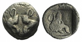 Lesbos, Uncertain, c. 500-450 BC. BI 1/36 Stater (6mm, 0.21g, 9h). Confronted boars’ heads. R/ Boar’s head r. within incuse square. Unpublished in the...