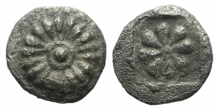 Ionia, Erythrai, c. 480-450 BC. AR Hemiobol (5mm, 0.30g). Rosette. R/ Simpler ro...
