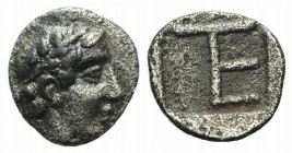Ionia, Kolophon, c. 450-410 BC. AR Tetartemorion (5mm, 0.23g, 7h). Laureate head of Apollo r. R/ TE monogram in incuse square. Milne, Colophon 31; SNG...