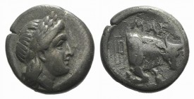 Ionia, Magnesia ad Maeandrum, c. 400-350 BC. AR Trihemiobol (10mm, 1.64g, 5h). Laureate head of Apollo r. R/ Forepart of bull butting r.; maeander pat...