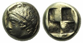 Ionia, Phokaia, c. 478-387 BC. EL Hekte – Sixth Stater (9mm, 2.53g). Head of young male l., wearing tainia; to r., small seal downward. R/ Quadriparti...