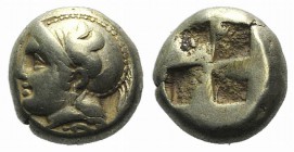 Ionia, Phokaia, c. 478-387 BC. EL Hekte – Sixth Stater (8mm, 2.48g). Head of Athena l., wearing crested Attic helmet decorated with griffin; below, se...