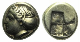 Ionia, Phokaia, c. 387-326 BC. EL Hekte – Sixth Stater (9mm, 2.54g). Laureate female head l., hair in sakkos; below, inverted seal r. R/ Quadripartite...