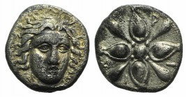 Satraps of Caria, Hidrieus (c. 351/0-344/3 BC). AR Obol (8mm, 0.81g). Halikarnassos. Head of Apollo facing slightly r. R/ 8-pointed star or floral pat...