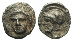 Cilicia, Tarsos. Pharnabazos (380-374/3 BC). AR Obol (8mm, 0.72g, 6h), c. 380 BC. Female head facing slightly l.; dolphins flanking. R/ Bearded head l...