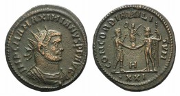 Maximianus (286-305). Radiate (21 mm, 4.16g, 7h). Cyzicus, AD 293. Radiate and cuirassed bust r. R/ Jupiter presents Victory on a globe to Maximianus;...