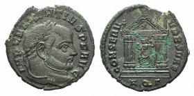 Maxentius (306-312). Æ Follis (24mm, 6.51g, 12h). Aquileia, 307-310. Laureate bust r. R/ Roma seated facing, head l., in hexastyle temple, holding glo...