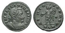 Licinius I (308-324). Æ Follis (22mm, 4.98g, 6h). Londinium, 310-2. Laureate, draped and cuirassed bust r. R/ Genius standing l., holding patera and c...