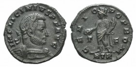 Licinius I (308-324). Æ Follis (19mm, 2.86g, 12h). Treveri, AD 316. Laureate, draped and cuirassed bust r. R/ Genius standing l., holding patera and c...