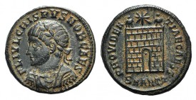 Crispus (Caesar, 316-326). Æ Follis (19mm, 3.56g, 11h). Antioch, 324-5. Laureate, draped and cuirassed bust l. R/ Camp-gate with two turrets, star abo...