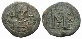 Justinian I (527-565). Æ 40 Nummi (34mm, 18.35g, 6h). Antioch, year 22 (548/9). Facing helmed and cuirassed bust, holding globus cruiciger. R/ Large M...