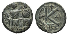 Justin II and Sophia (565-578). Æ 20 Nummi (18mm, 6.12h, 6h). Thessalonica, year 5 (569/70). Nimbate figures of Justin and Sophia seated facing on dou...