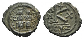 Justin II and Sophia (565-578). Æ 20 Nummi (23mm, 6.15g, 6h). Cizycus, year 10 (574/5). Nimbate figures of Justin and Sophia seated facing on double t...