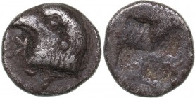 Aeolis - Kyme AR Hemiobol - (450-400 BC)
0.49 g. 8mm. VF K-Y Eagle's head to left.