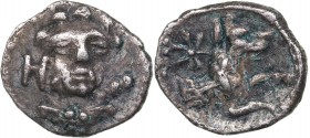 Lykaonia - Laranda AR Obol (circa 324 BC)
0.62 g. 11mm. VF+/VF Facing head of Herakles, club over shoulder; H to left / Forepart of wolf right; star ...