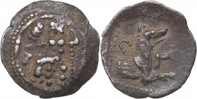 Lykaonia - Laranda AR Obol (circa 324/3 BC)
0.64 g. 14mm. VF/VF Baaltars seated left, holding grain ear, grape bunch, and sceptre. / Forepart of wolf...