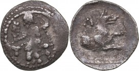 Lykaonia - Laranda AR Obol (circa 324/3 BC)
0.58 g. 13mm. XF/XF Baaltars seated left, holding grain ear, grape bunch, and sceptre. / Forepart of wolf...