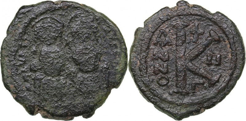 Byzantine AE Half Follis - Justin II and Sophia (565-578 AD)
6.56 g. 24mm. VG/F