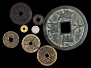 Ancient Chinese Coins

CHINA. Qing Dynasty. Octet of Charms and Amulets (8 Pieces). Grade Range: FINE to ABOUT UNCIRCULATED.

Cash-shaped pieces o...