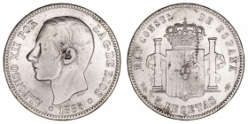 La Peseta
Alfonso XII
5 Pesetas. AR. 1885 PGM. Falsa de época. 24.99g. Barrera 1241. MBC.