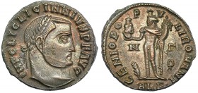 LICINIO I. Follis. Alejandría (313-314). Marcas: N y palma - Γ y corona en el campo. ALE• en el exergo. R/ GENIO POPVLI ROMANI. RIC-5 (R4). Pequeña er...