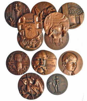 Lote de 12 medallas. F.N.M.T. Bronce 85 mm. Todas diferentes. SC.