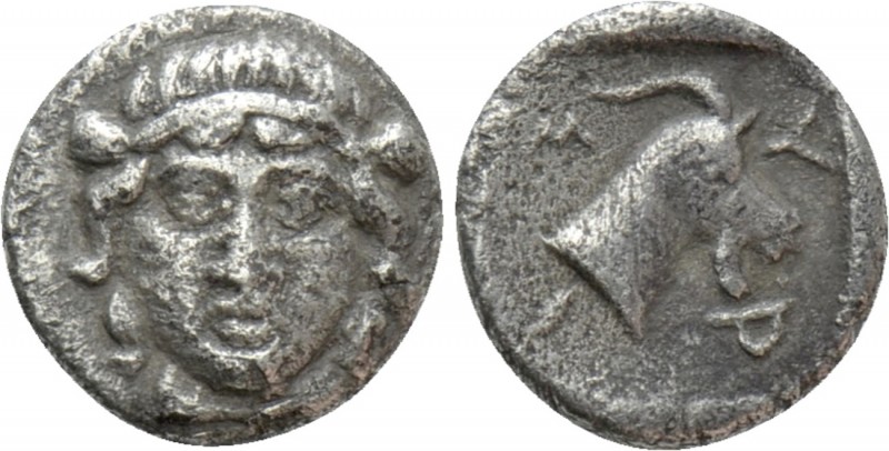 AEOLIS. Myrina. Obol (4th century BC)

Obv: Female head facing, with hair in b...