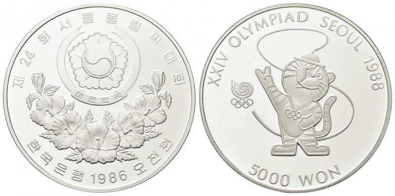 Sud Korea
Repubblica, dal 1945
5000 Won 1988.
Ag 
gr. 16,75
Dr. Stemma Nazi...