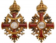 AUSTRIA
The Imperial Order of Franz Joseph
Miniature of the Order’s badge in GOLD and enamels, 30x18 mm, separatelymade medallions and “chain” beari...