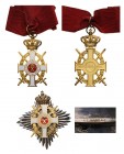 GREECE
The Order of George I
A Grand Commander’s set with swords: neck badge, 83x47 mm, in gilt Silver and white enameled cross with a gilt laurel w...