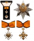 GREECE
Order of the Phoenix
A 2nd type Grand Commander’s set with swords: the badge, 79x54 mm, 
in gilt Silver and white enamel, obverse centre wit...