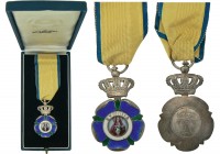 GREECE
Order of Welfare
A Dame Silver Medal, 1st type, 51x30 mm, silver badge with dark blue and green 
enameled details, the centre with the image...